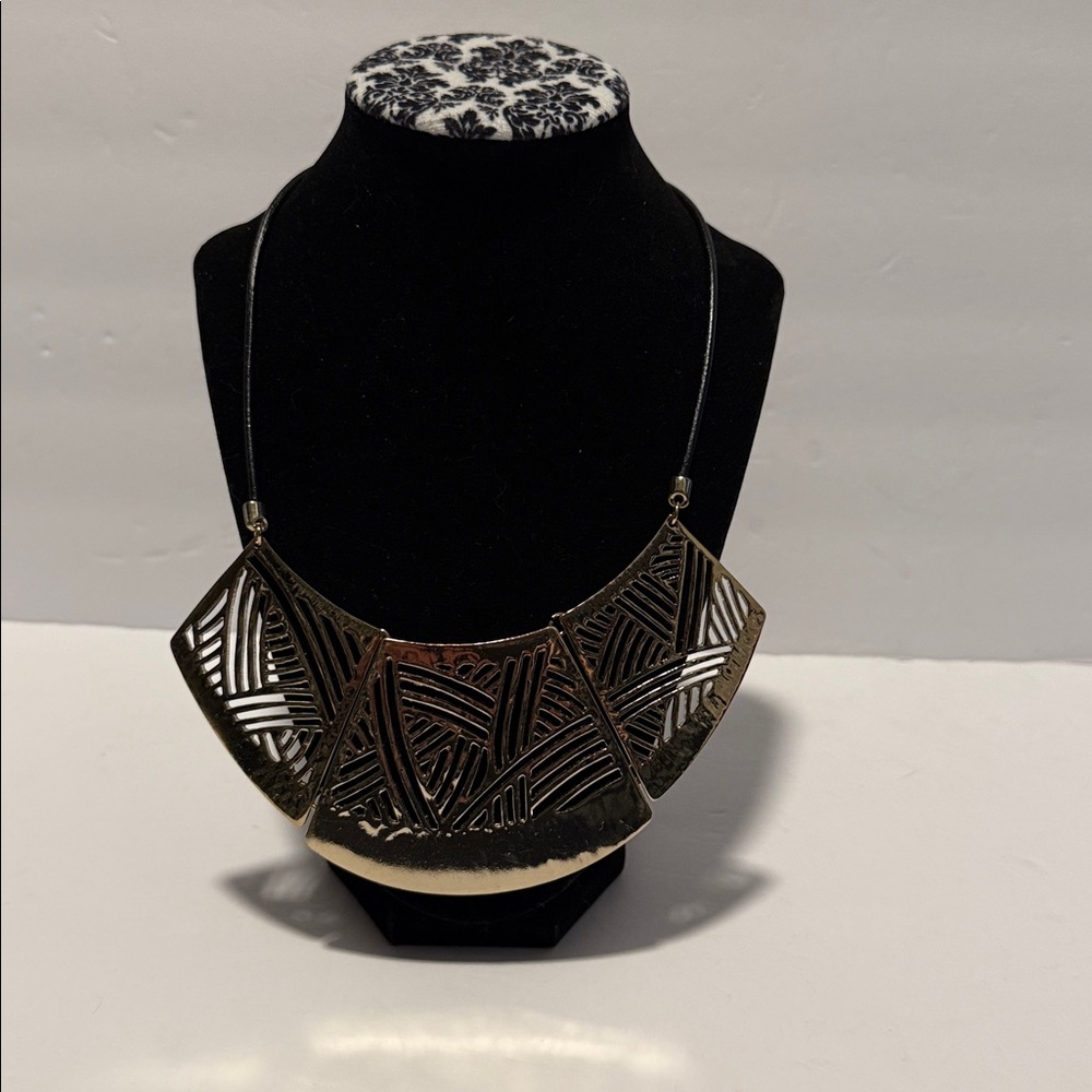 49.  Chic Black and Silver Statement Necklace.